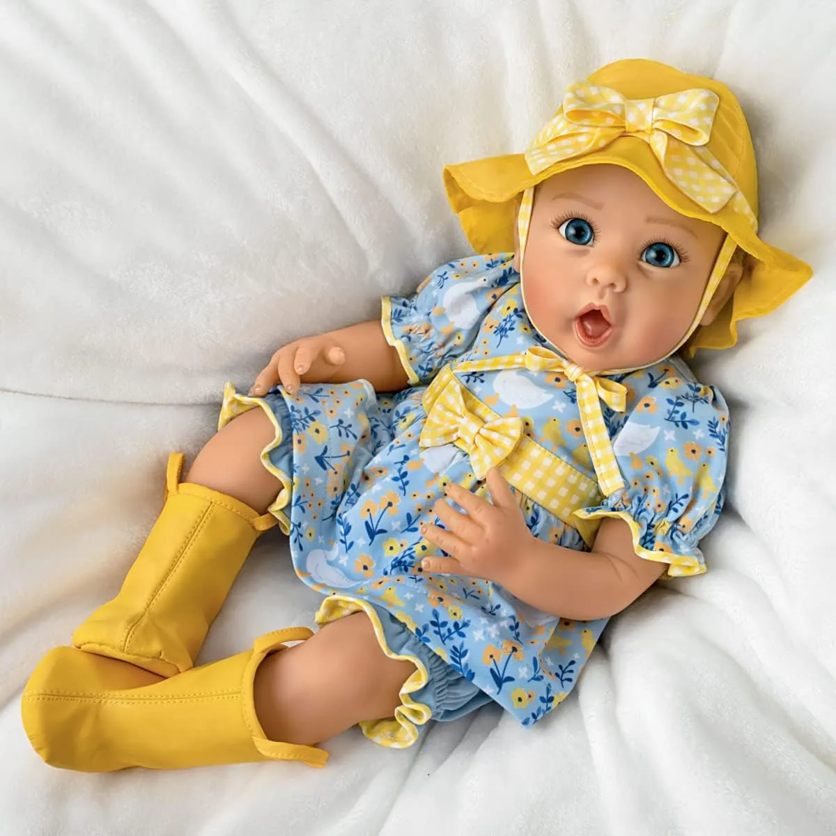 The Ashton-Drake Galleries Singing in The Rain So Truly Real® Interactive Lifelike Baby Girl Doll That Babbles with Custom 4-Piece Rain Themed Ensemble Complete with Rain Boots and A Bucket Hat 21"-Inches